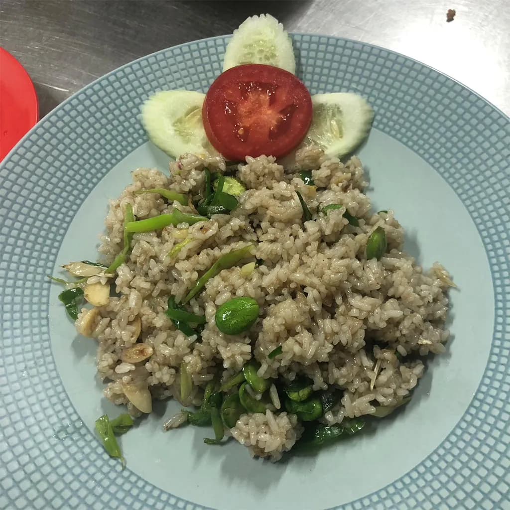 Original smartphone photo of a restaurant dish with uneven lighting and tight framing.